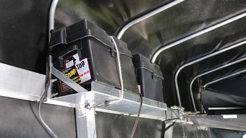battery boxes on tray under canopy