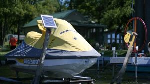 personal watercraft lift with solar charging kit